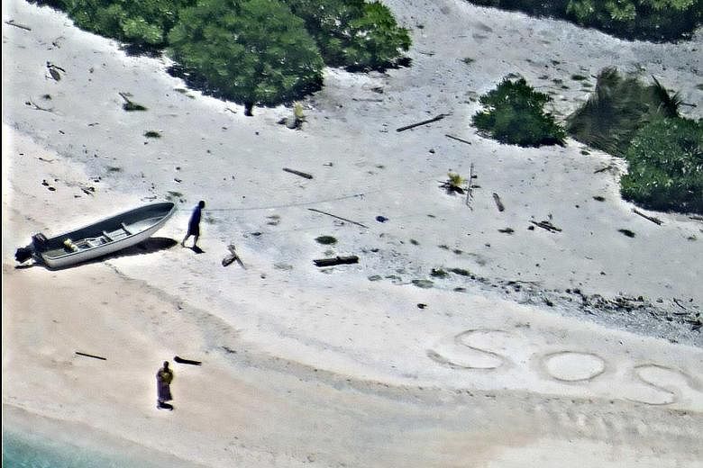 This couple, who were stranded for a week on the uninhabited East Fayu island in Micronesia, were found by a US Navy air crew who located them after spotting their SOS sign in the sand.