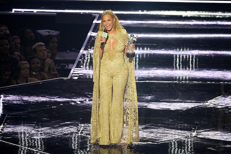 Beyonce accepting the Best Female Video award at the 2016 MTV Video Music Awards on Sunday. She brought the house down with a song-and-dance routine, earning a long standing ovation.