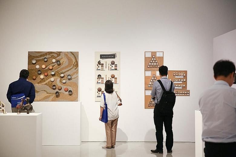 The National Institute of Education's exhibition of Iskandar Jalil's works includes a segment on different types of local clay, which the potter uses.