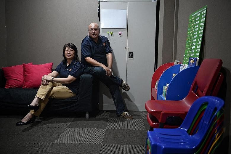 Ms Jolene Ong, 53, chairman and founder of The Silver Lining Community Services, and Mr Kelvin Tay, 50, a board member and counsellor at the organisation. Ms Ong noted that for people earning less than $2,000 a month, the amount of debt owed to legal