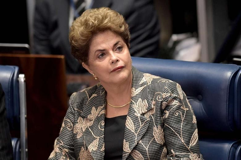 Ms Rousseff at the impeachment trial yesterday. She branded accusations against her as "a pretext for a constitutional coup". 
