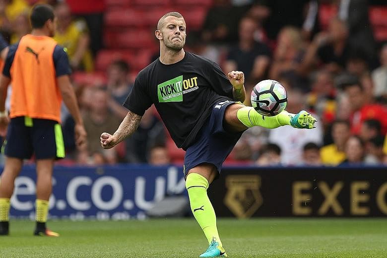 Arsenal manager Arsene Wenger believes that Jack Wilshere (left) can return to form by playing regular football elsewhere. England coach Sam Allardyce echoes his thoughts and wants to see more action from the player before he can be picked for the na