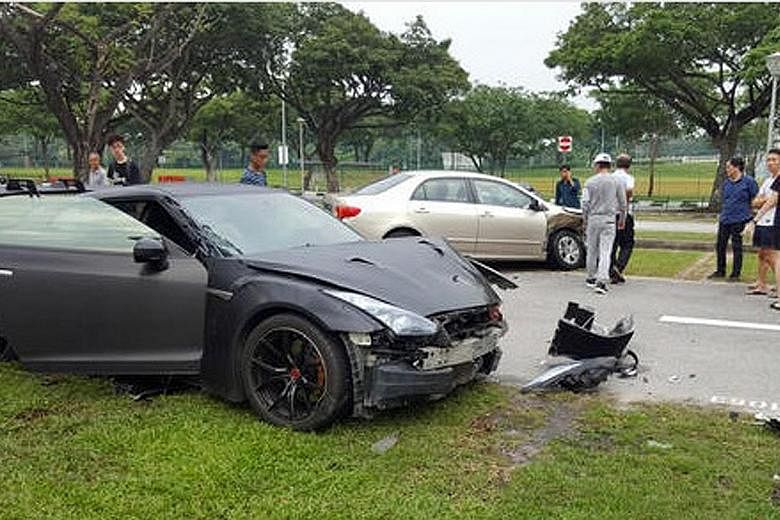 The Nissan GTR (left) driven by the suspect crashed into a Toyota car in a carpark near Stadium Road on Saturday.