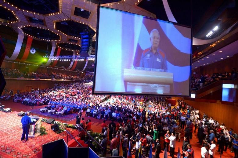 Mr Najib delivering his annual speech at Putra World Trade Centre in Kuala Lumpur last night, the eve of Malaysia's 59th Independence Day. He highlighted the country's economic achievements and infrastructure development. 