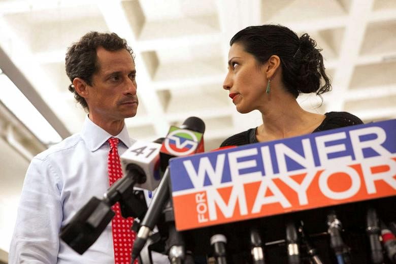 Ms Abedin (right) stood by her husband, Mr Weiner (left), as he attempted a political comeback in 2013 by contesting in the New York mayoral race. 