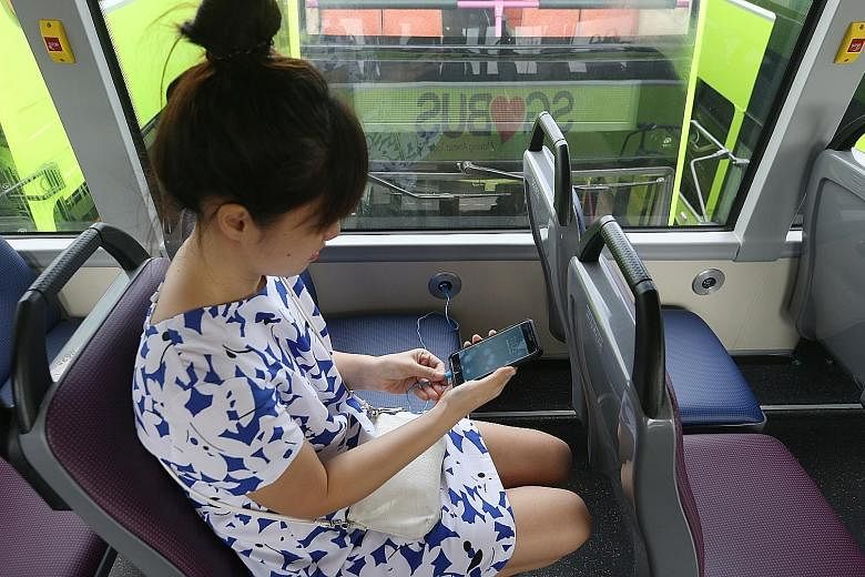 The 10 buses will begin running on five of SMRT's services from today. Commuters will have to use their own charging cables.