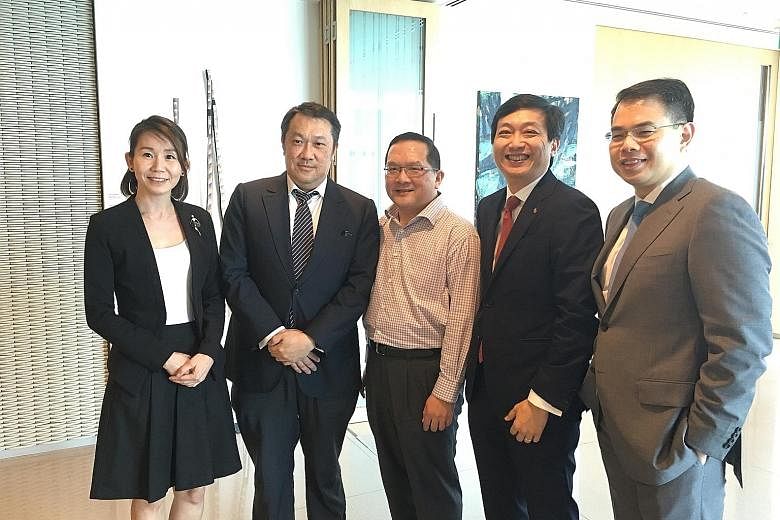 (From left) Ms Ng of Keppel Reit Management, Mr Ho of YTL Starhill Global Reit Management, Mr Tuck of Macquarie Securities Singapore, Mr Tay of Ascott Residence Trust Management and Mr Koh of Aims AMP Capital Industrial Reit spoke at a forum hosted b