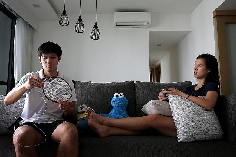 National shuttler Vanessa Neo and husband Derek Wong, Singapore's top men's singles player, spending time together in their executive condominium unit in Punggol. The Singapore Badminton Association has also been a home to them for years but the pair