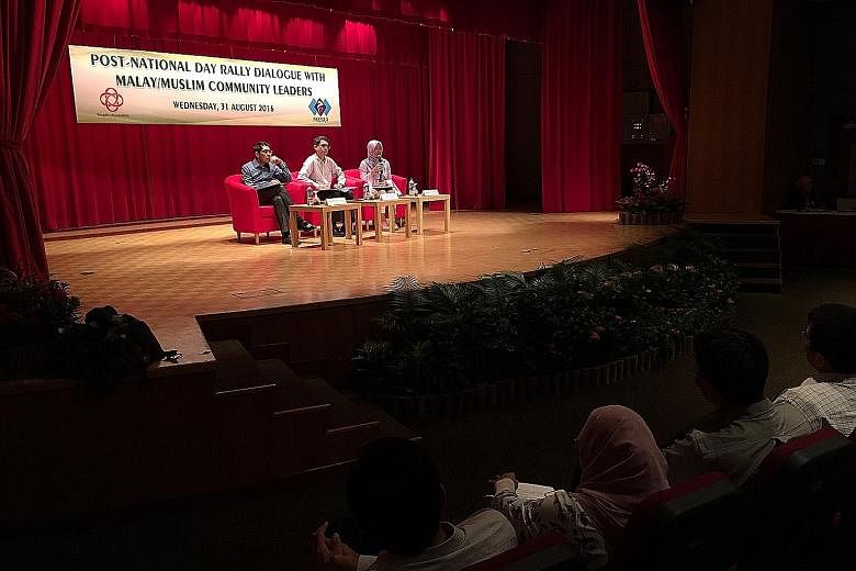 (From left) Dr Maliki, Dr Faishal and Ms Rahayu fielding questions from participants at the dialogue, which was held at the Grassroots Club in Yio Chu Kang yesterday.