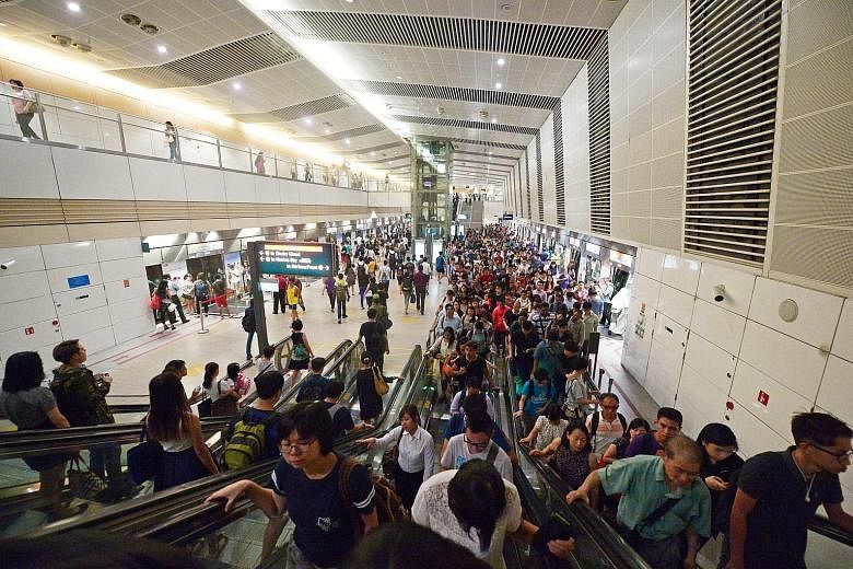 Commuters at Bishan MRT station yesterday. Since Monday, journeys on the Circle Line have been taking longer than usual as trains intermittently lose signalling communication with the tracks.