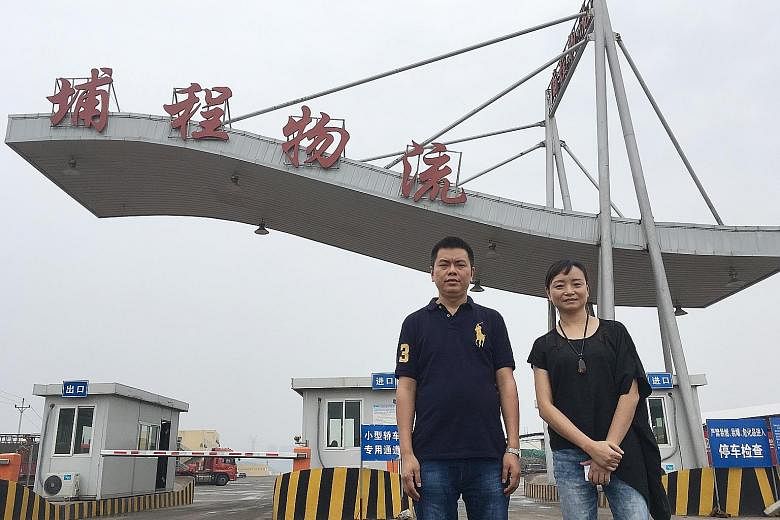 Mr Tian Zhongyou, Chongqing Pucheng Logistics' general manager, with Ms Ding Yan, the company chairman. Ms Ding says she is a "big beneficiary of the CCI", referring to the Chongqing Connectivity Initiative, the third Singapore-Sino government-led pr