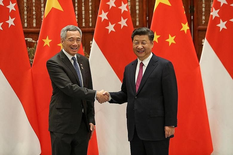 PM Lee and Mr Xi meeting for bilateral talks in Hangzhou yesterday. They exchanged views on Singapore's role as Asean-China dialogue relations coordinator. Mr Lee is on a four-day working visit to China.