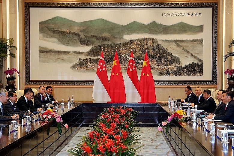 PM Lee and President Xi, and their respective delegations, meeting for bilateral talks at the West Lake State Guesthouse yesterday on the sidelines of the Group of 20 leaders' summit.