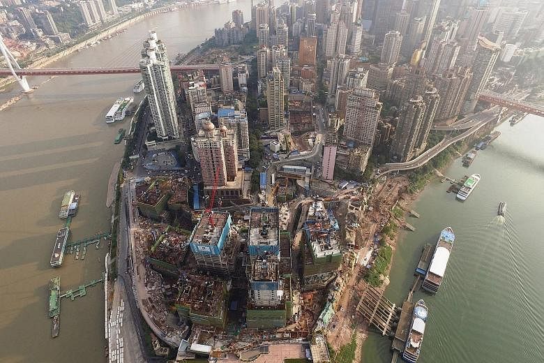 The Raffles City Chongqing site last month. The project by CapitaLand is the largest single investment by a Singapore company in China.