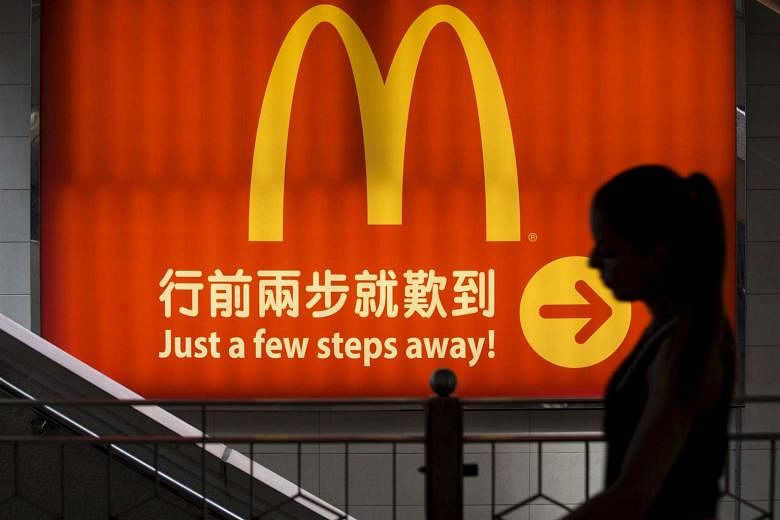 McDonald's hired Morgan Stanley to run the sale of about 2,800 restaurants in China, Hong Kong (left) and South Korea. China and Hong Kong account for more than 85 per cent of the total 2,800 outlets up for grabs. 