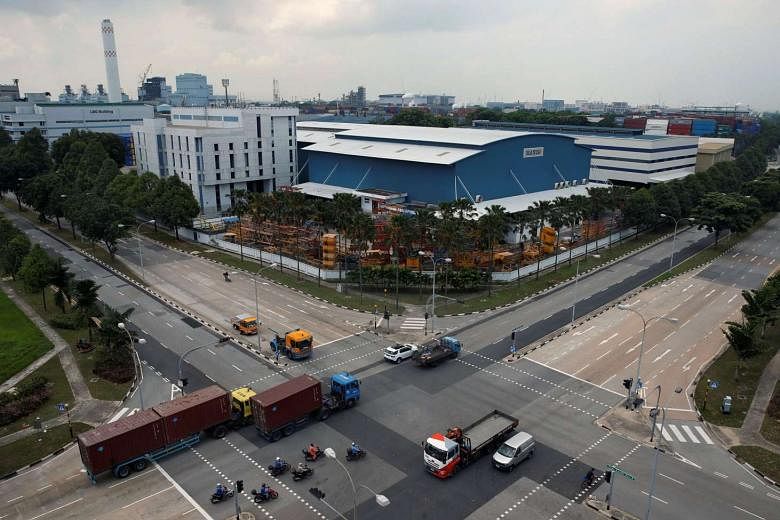 Factories in the Jurong industrial district. Last month's PMI reading of 49.8 was up slightly from July's, but economists warned against over-optimism. 