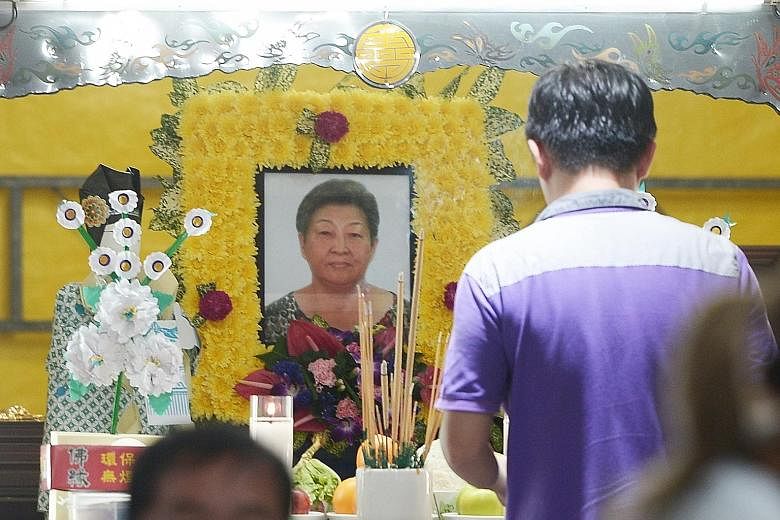 Madam Ong Lim was struck on the head by a road sign believed to have been dislodged by a runaway bus. She later died in hospital.