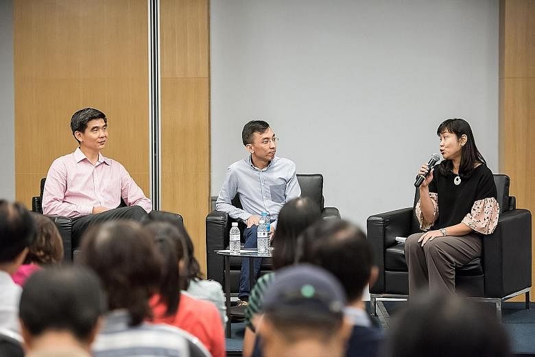 Mr Soh Chin Heng, deputy chief executive officer (services) of the CPF Board (far left), and Mr Christopher Tan, a CPF Advisory Panel member, at the roadshow moderated by Ms Lorna Tan