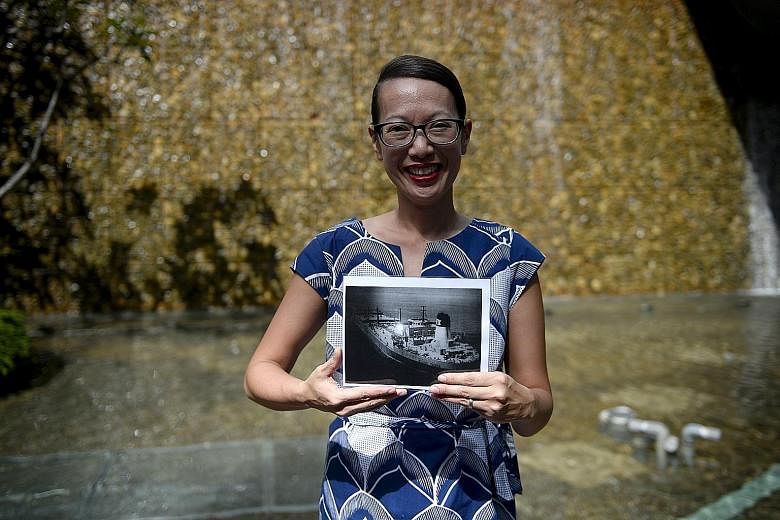 Social entrepreneur Yen Siow, 39, with a picture of the Norwegian oil tanker which rescued her family from a rickety boat in the middle of the South China Sea when she was barely four years old and a Vietnamese refugee. The picture had been given to 