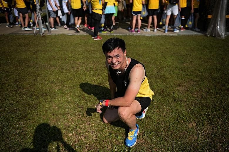 Superintendent of Prisons Jimmy Lee, who was the organising chairman of the inaugural Yellow Ribbon Prison Run in 2009, pictured here with the 2009 Run singlet yesterday, at the eight edition of the run.