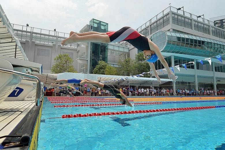 Swimmers from the 12-and-under girls' category diving off the blocks in the 100m freestyle heats at the inaugural CSC Super Junior Swimming Invitational. The two-day meet saw over 400 swimmers take part and will be an annual affair.