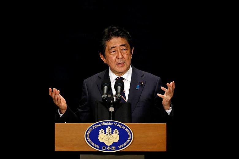 Mr Abe (above) and Mr Xi pledged to speed up talks on the setting up of a maritime hotline between senior defence officials of both countries to prevent accidental clashes in the East China Sea.