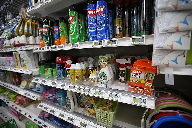 Anti-mosquito products on sale at a FairPrice outlet in Hougang. Sales of these items have surged after local transmissions of Zika were reported here. FairPrice said it has placed an additional order for 175,000 pieces of various types of insecticid