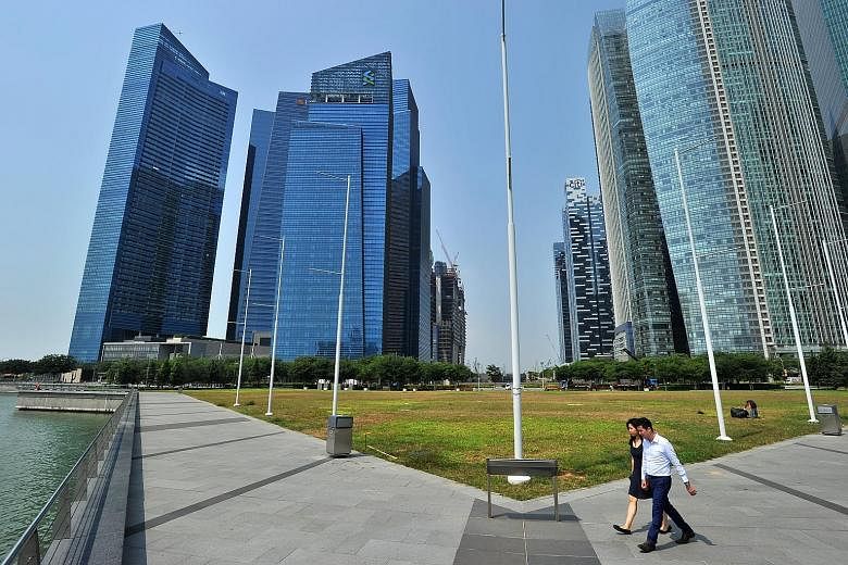 Marina Bay Financial Centre (left), which Keppel Reit has an interest in. The Global Real Estate Sustainability Benchmark (GRESB) report ranked Keppel Reit first among listed real estate companies globally. CapitaLand (below) was named Asia's most su