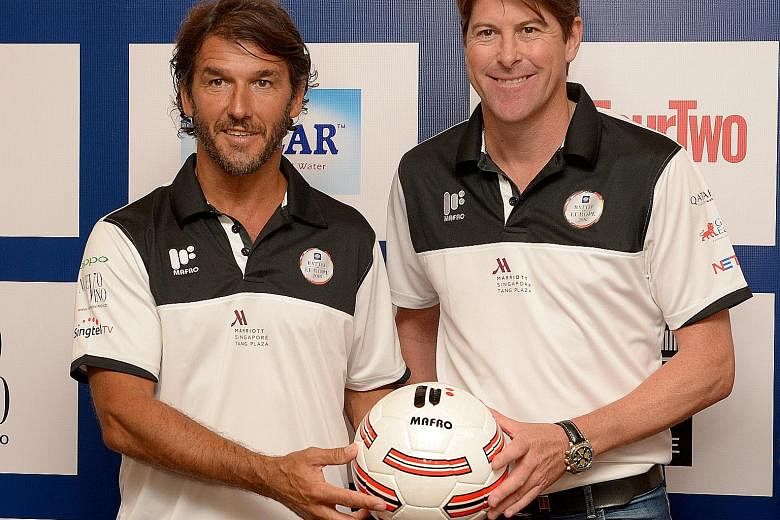 Germany's Karl-Heinz Riedle (left) and England's Darren Anderton will do battle in a Masters friendly match at the National Stadium on Nov 12.