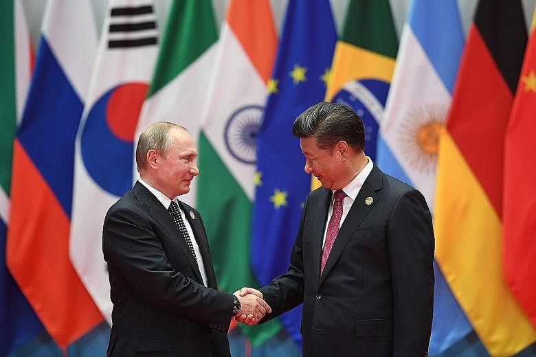 Russian President Vladimir Putin meeting Chinese President Xi Jinping at the G-20 summit in Hangzhou earlier this month. As more unites Beijing and Moscow than divides them, both have agreed to tactically cooperate on a range of issues that touch on 