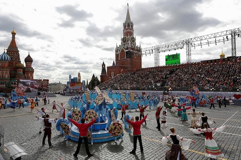 Artists performing during celebrations at Red Square for Moscow's 869th birthday on Saturday. The city was estimated to have spent more than half a billion roubles (S$10.5 million) for more than 1,000 events over the weekend, reported Moscow Times.