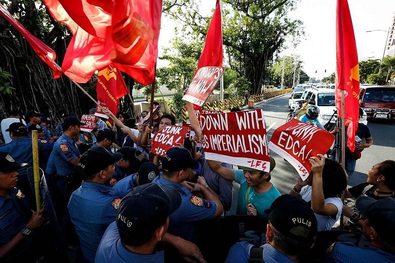 Activists from the League of Filipino Students staging a protest against continuing US intervention in the country near the US Embassy in Manila on Sunday.