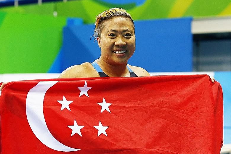 Swimmer Theresa Goh celebrating her bronze medal win in the 100m breaststroke SB4 final at the Rio Paralympics on Sunday evening. It was the 29-year-old's first Paralympic medal after four Games spanning 12 years, and followed fellow swimmer Yip Pin 
