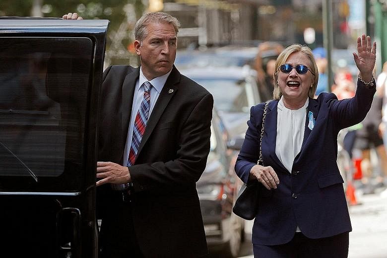Mrs Clinton leaving her daughter's home in New York on Sunday. The Democratic nominee was treated for pneumonia after abruptly leaving a Sept 11 memorial ceremony earlier that day.