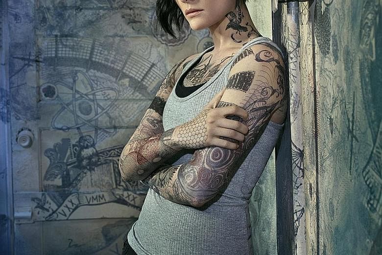 Actress Jaimie Alexander, playing Jane Doe (left), is set to deliver an action-packed new season of Blindspot.