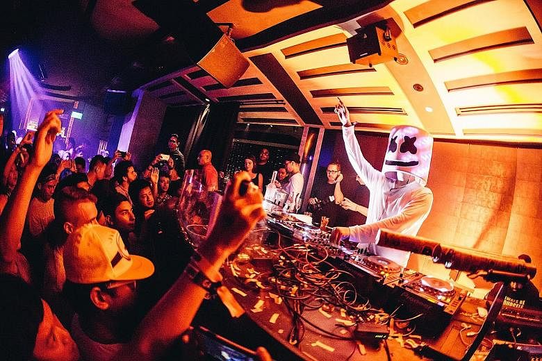 The real DJ Marshmello (above) expressed his disappointment in Zouk for confusing guests.