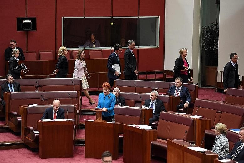 Greens MPs staging a walkout in Parliament yesterday while right-wing politician Pauline Hanson was delivering her maiden speech. Greens leader Richard Di Natale later said that racism has no place in Parliament.
