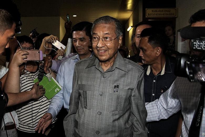Dr Mahathir (above) had fired Anwar as deputy prime minister on Sept 2, 1998, and the latter was later jailed on sodomy and corruption charges. Anwar's daughter Nurul Nuha now wants Dr Mahathir to own up to "trumped-up" charges against her father.