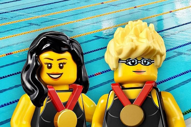 Swimmers Yip Pin Xiu and Theresa Goh's exploits, winning gold and bronze respectively, have earned them Lego mini-figures in their image.