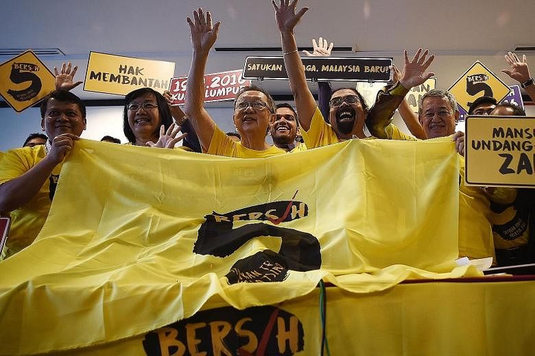 Ms Maria Chin Abdullah (second from left), Bersih's chairman, with other activists following a press conference in Kuala Lumpur yesterday. The November rally will be the second in 15 months that aims to oust Datuk Seri Najib over claims that more t