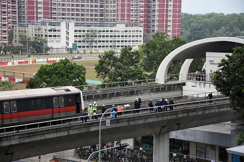 Two trainees were killed when they were hit by a train on the track near Pasir Ris station on March 22. SMRT said in April that failure to follow safety measures - including allowing a train to ply in automatic mode while workers were on site, and no