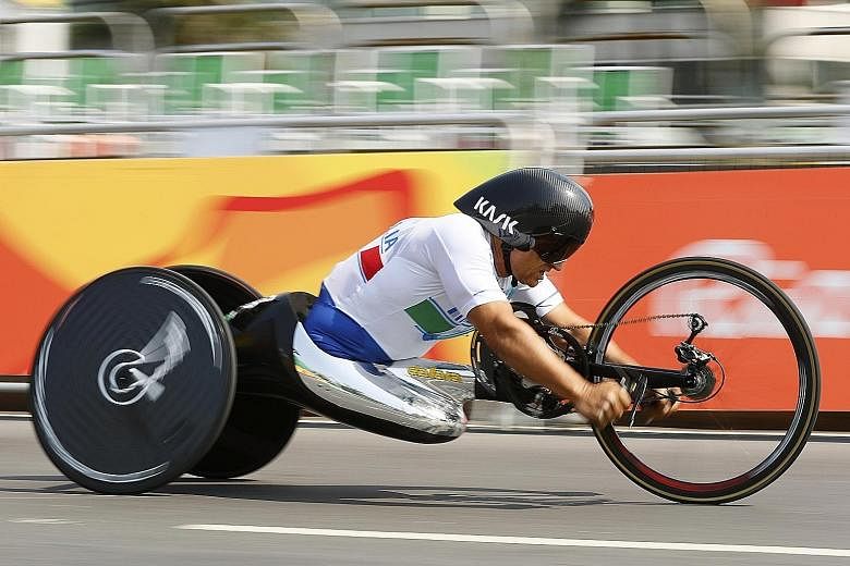 Alex Zanardi of Italy competing in the 20km H5 handcycling road time trial at the Rio Paralympics. The 49-year-old had both his legs amputated above the knee after a Champ Car crash in Germany 15 years ago today.