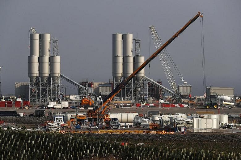 The new government had stunned investors by putting the Hinkley Point C nuclear power station project on hold in July - just hours before the deal was due to be signed.