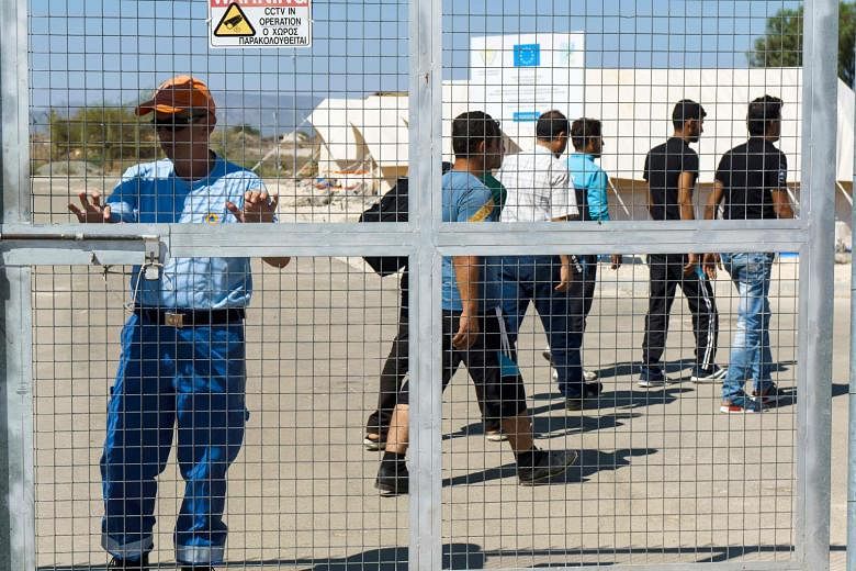 Syrian migrants arriving at the Kokkinotrimithia refugee camp in Cyprus on Sept 7. Immigrant Muslim communities in Europe are beset with serious problems of integration. More have entered Europe as refugees from war-torn Muslim countries, and the situatio