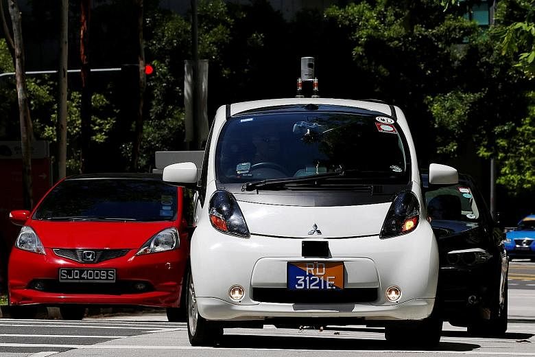 A self-driving taxi on the road in its public trial in Singapore last month.