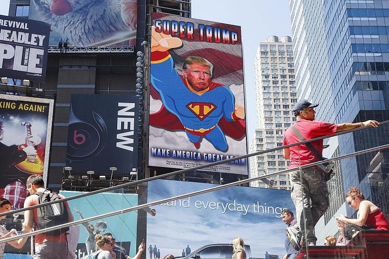 A New York City billboard in support of the Republican presidential nominee. On the subject of Mr Obama's place of birth, Mr Trump said in an interview: "I'll answer that question at the right time."