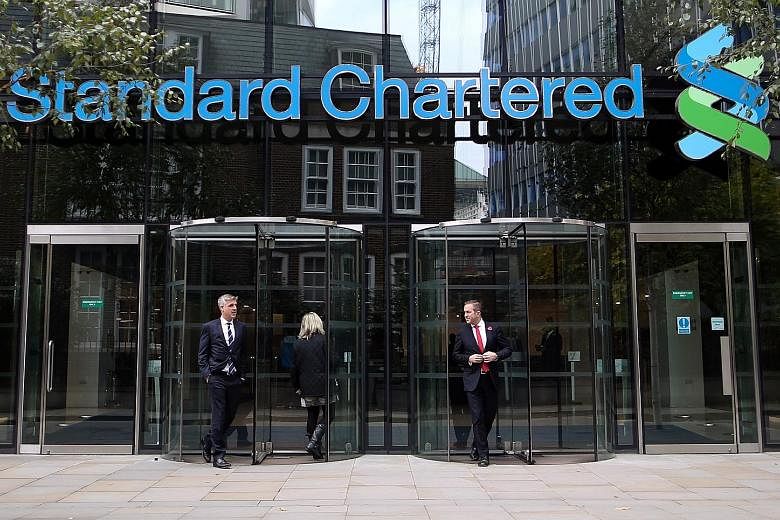 The Standard Chartered headquarters in London. Regulators in Europe and the US have made it harder for banks to invest shareholders' cash in illiquid funds since the financial crisis, leading to a series of so-called spin-outs where employees become 