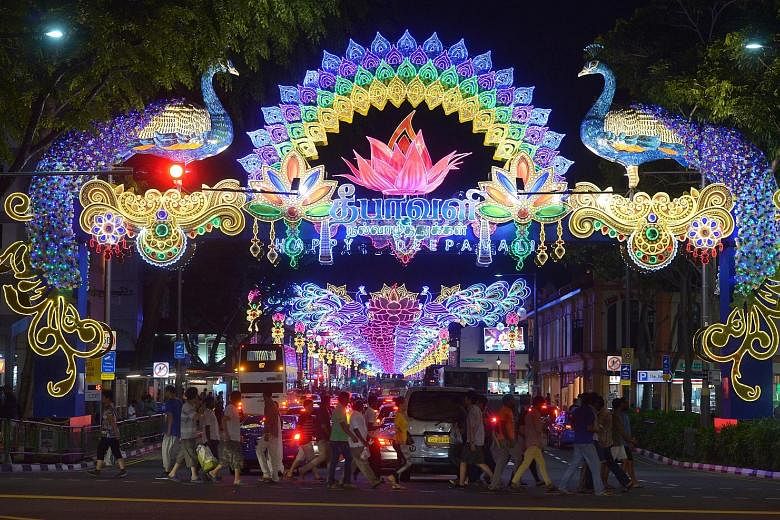 Lights, camera... time to snap away. Deepavali celebrations got off to a sparkling start in Little India last night with a light-up ceremony featuring a dazzling display of 1.5 million LED lights lining the streets. The event graced by President Tony