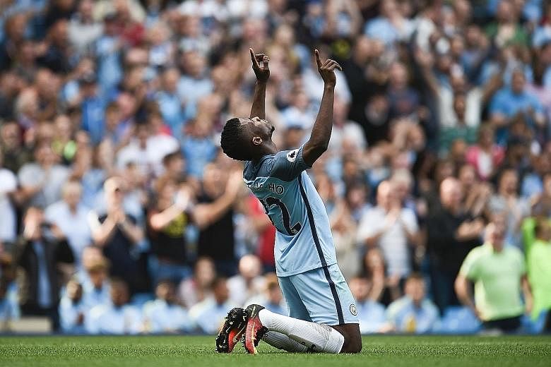Manchester City striker Kelechi Iheanacho celebrating after scoring their second goal in the 4-0 Premier League win over Bournemouth yesterday. City sit on top of the table with five wins out of five.