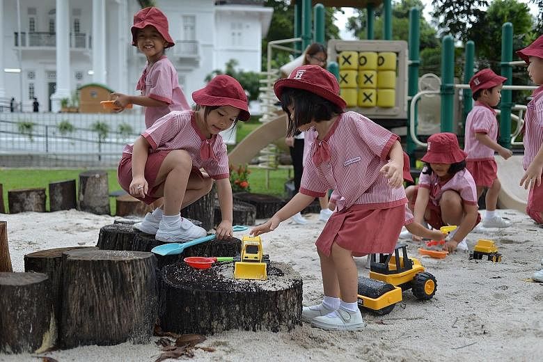 Children from a nursery class at St James' Church Kindergarten at play. The enrolment there bucks the declining trend. Even so, it is considering opening a childcare centre after multiple requests from parents.
